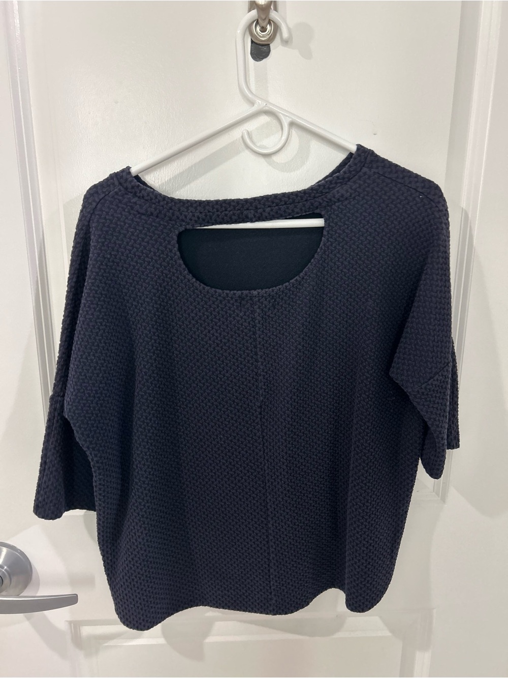 Blue top from Deletta with open back detail